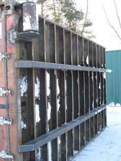Slide rails on a modified container